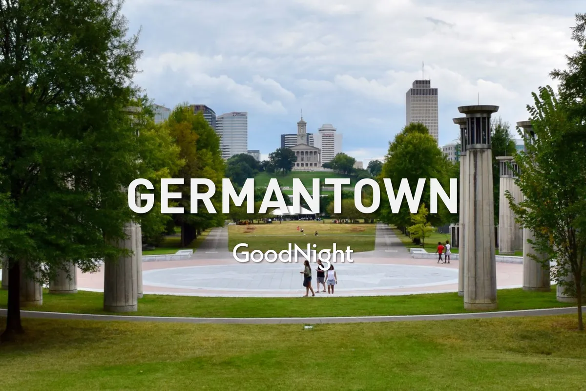 A welcoming city park scene with an open green space, walking path, trees, and Nashville’s skyline in the background, inviting visitors to enjoy the outdoors and urban environment.