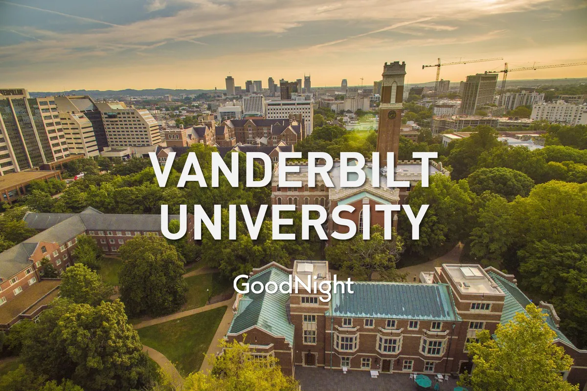 A sweeping view of the Vanderbilt University clock tower rises above lush trees and the urban skyline in the background. The scene is lively and open, suggesting a central location with easy access to both natural and city attractions.